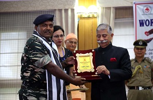 The Governor of Arunachal Pradesh Brig. (Dr.) B.D. Mishra (Retd.) felicitating Central Police Forces on the occasion of World Bloods Donor Day celebration at Raj Bhawan, Itanagar  on 14th  June 2018.